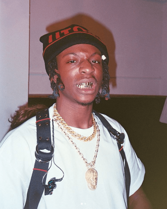 Joey Bada$$ posing on the AMERIKKKANA TOUR