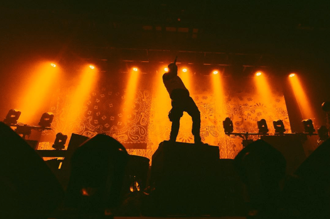 Joey Bada$$ performing on AMERIKKKANA Tour