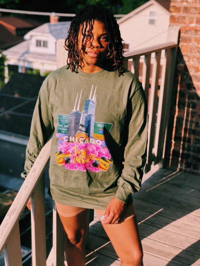 Bria posing in Soul Culture 'midwest in bloom' long sleeved tee