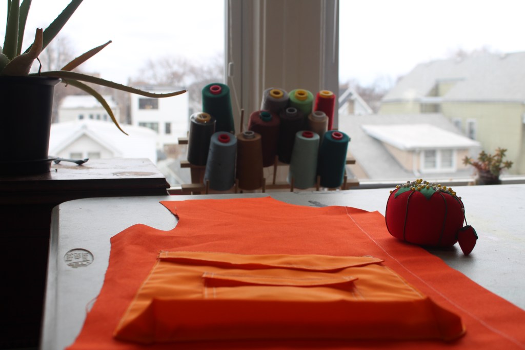 Swaintheory Teaser for Upcoming Brand Release - orange vest